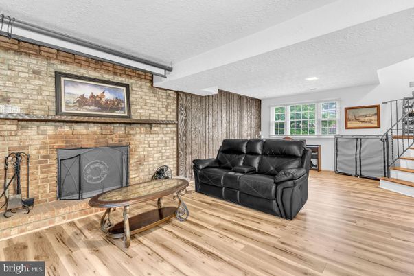 Fireplace, Interior, Recessed Lighting, Stone Walls, Wood Texture Flooring
