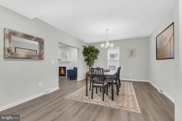 Chandelier, Dining room, Fireplace, Interior, Wood Texture Flooring