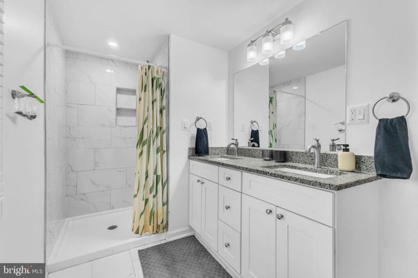 Bathroom, Dual Sink Vanities, Interior, Marble Walls, Recessed Lighting