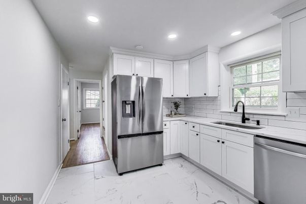 Interior, Kitchen, Marble, Recessed Lighting, Stainless Steel Appliances, Wood Texture Flooring