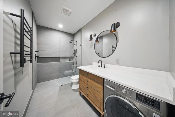 Bathroom, Dual Sink Vanities, Glass Shower, Interior, Recessed Lighting, Washer