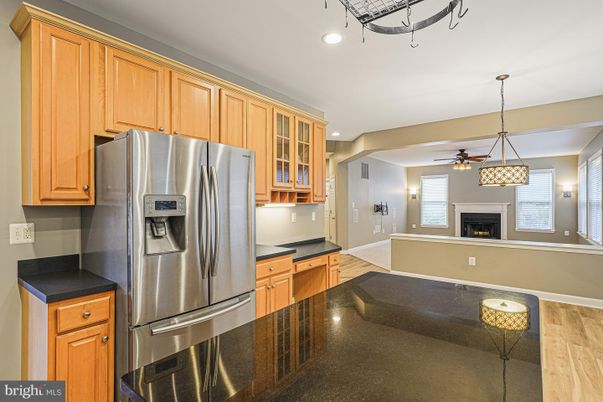 Fireplace, Interior, Kitchen, Pendant Lights, Recessed Lighting, Stainless Steel Appliances, Wood Texture Flooring