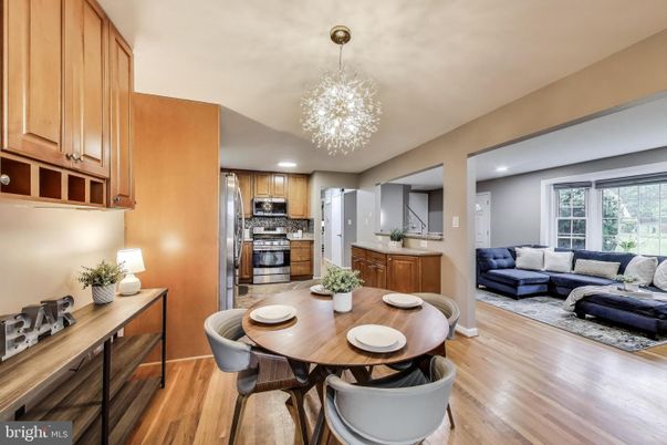 Chandelier, Dining room, Interior, Kitchen, Living room, Recessed Lighting, Stainless Steel Appliances, Wood Texture Flooring