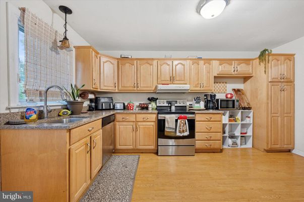 Interior, Kitchen, Pendant Lights, Stainless Steel Appliances, Wood Texture Flooring