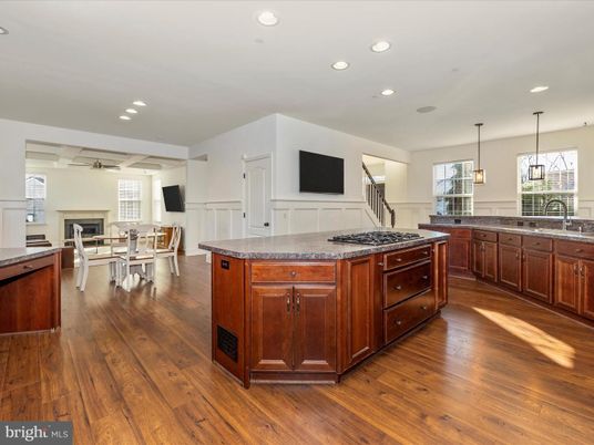 Dining room, Fireplace, Interior, Kitchen, Pendant Lights, Recessed Lighting, Wood Texture Flooring