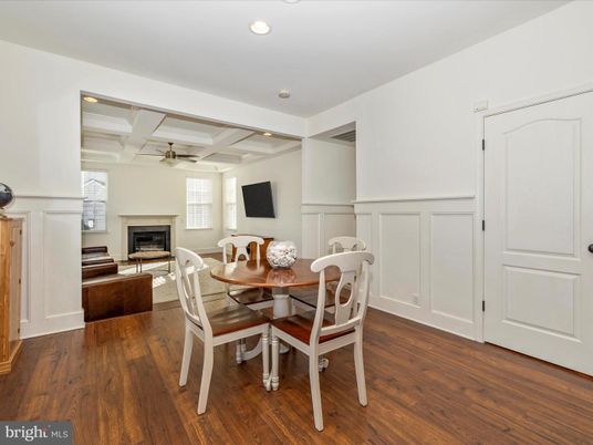 Dining room, Fireplace, Interior, Living room, Recessed Lighting, Wood Texture Flooring