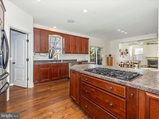 Dining room, Fireplace, Interior, Kitchen, Recessed Lighting, Wood Texture Flooring