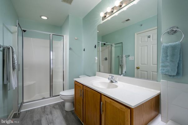 Bathroom, Glass Shower, Interior, Recessed Lighting, Wood Texture Flooring