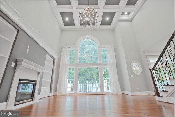 Chandelier, Empty room, Fireplace, Interior, Recessed Lighting, Wood Texture Flooring