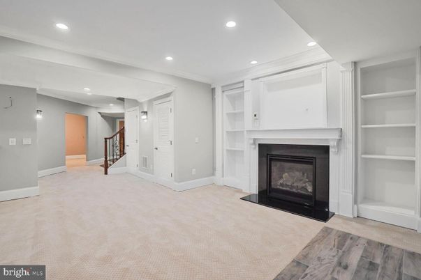 Empty room, Fireplace, Interior, Recessed Lighting, Wood Texture Flooring
