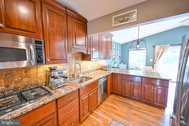 Interior, Kitchen, Pendant Lights, Stainless Steel Appliances, Wood Texture Flooring
