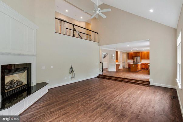 Fireplace, Interior, Kitchen, Recessed Lighting, Wood Texture Flooring