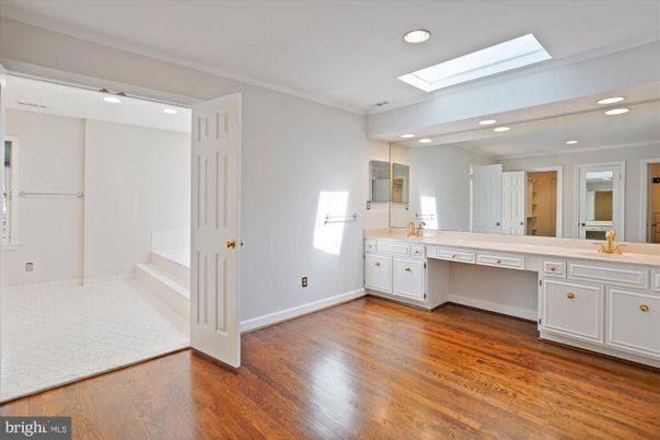 Bathroom, Dual Sink Vanities, Interior, Recessed Lighting, Wood Texture Flooring