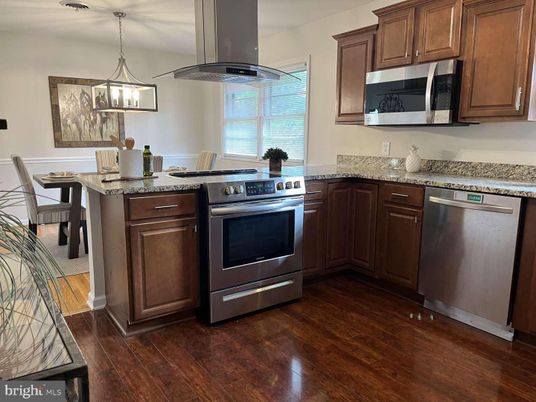 Dining room, Interior, Kitchen, Pendant Lights, Stainless Steel Appliances, Wood Texture Flooring