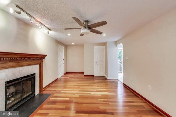 Empty room, Fireplace, Interior, Recessed Lighting, Wood Texture Flooring