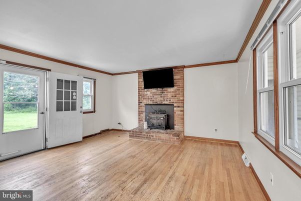 Empty room, Fireplace, Interior, Stone Walls, Wood Texture Flooring