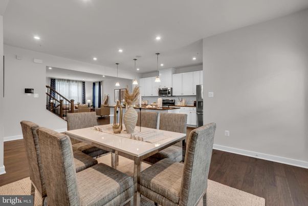 Dining room, Interior, Kitchen, Pendant Lights, Recessed Lighting, Stainless Steel Appliances, Wood Texture Flooring