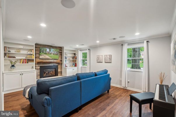 Fireplace, Interior, Living room, Recessed Lighting, Wood Texture Flooring, Wooden Walls