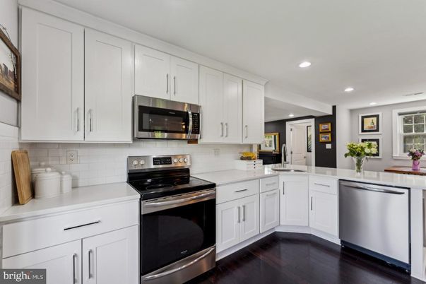 Interior, Kitchen, Recessed Lighting, Stainless Steel Appliances, Wood Texture Flooring
