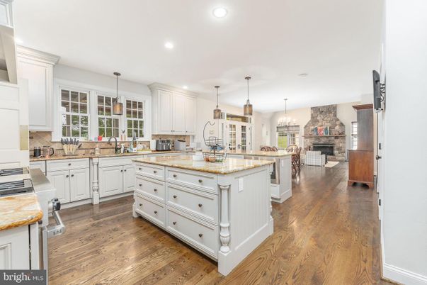Chandelier, Fireplace, Interior, Kitchen, Pendant Lights, Recessed Lighting, Wood Texture Flooring