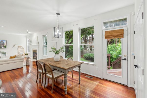 Dining room, Fireplace, Interior, Living room, Pendant Lights, Recessed Lighting, Wood Texture Flooring