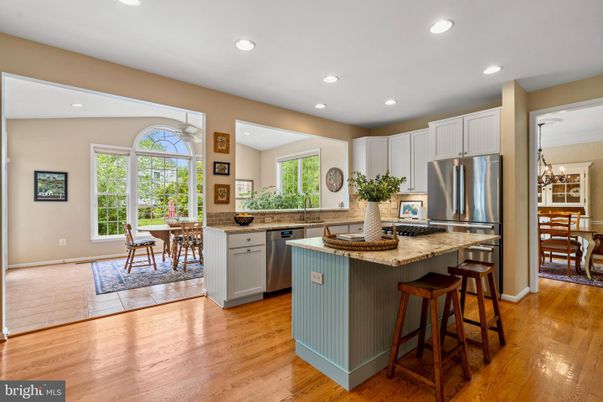 Dining room, Interior, Kitchen, Recessed Lighting, Stainless Steel Appliances, Wood Texture Flooring
