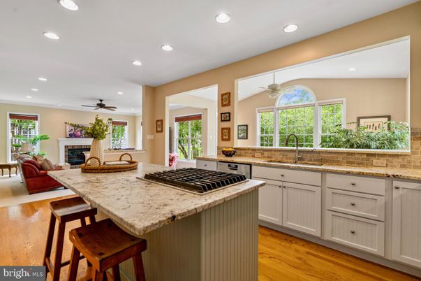Fireplace, Interior, Kitchen, Living room, Recessed Lighting, Wood Texture Flooring
