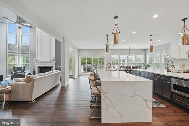 Dining room, Fireplace, Interior, Kitchen, Living room, Pendant Lights, Recessed Lighting, Wood Texture Flooring
