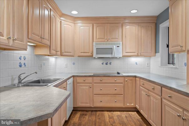 Interior, Kitchen, Recessed Lighting, Tile Countertops, Wood Texture Flooring