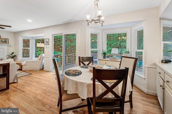 Chandelier, Dining room, Fireplace, Interior, Living room, Recessed Lighting, Wood Texture Flooring