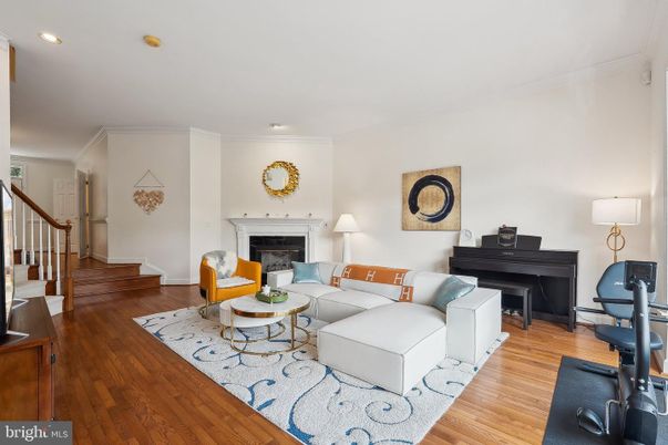 Fireplace, Interior, Living room, Piano, Recessed Lighting, Wood Texture Flooring