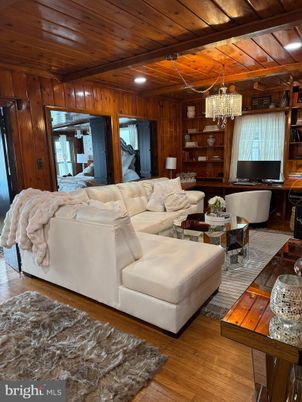 Chandelier, Interior, Living room, Recessed Lighting, Wooden Beams, Wooden Ceilings, Wood Texture Flooring, Wooden Walls