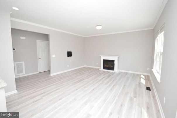 Empty room, Fireplace, Interior, Recessed Lighting, Wood Texture Flooring