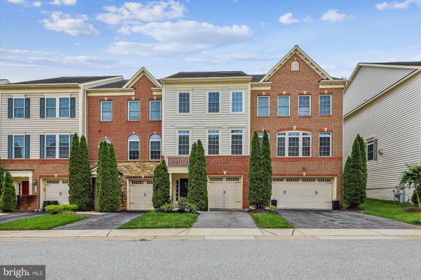 Attached, Exterior, Facade, Brick Facade, Rowhouse