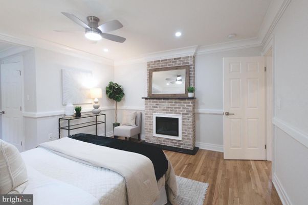 Bedroom, Fireplace, Interior, Recessed Lighting, Wood Texture Flooring