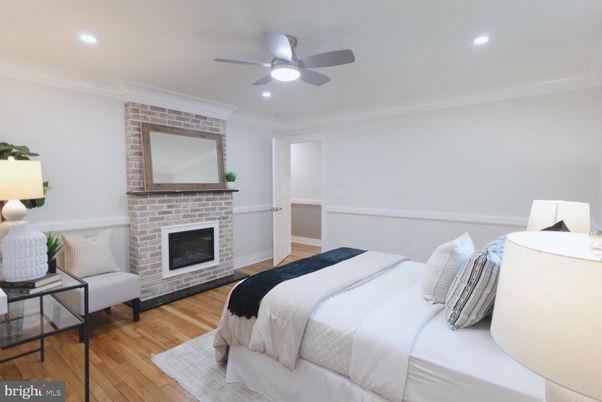 Bedroom, Fireplace, Interior, Recessed Lighting, Wood Texture Flooring