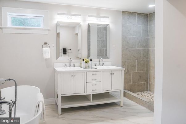 Bathroom, Dual Sink Vanities, Free Standing Baths, Interior, Marble, Recessed Lighting
