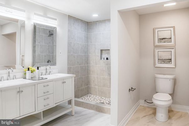 Bathroom, Dual Sink Vanities, Interior, Marble, Recessed Lighting, Wood Texture Flooring
