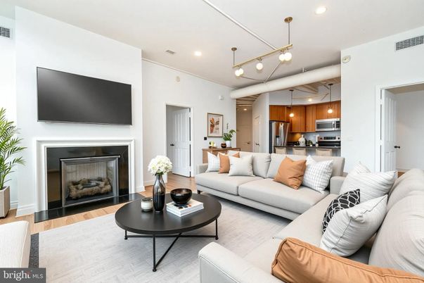 Fireplace, Interior, Kitchen, Living room, Pendant Lights, Recessed Lighting, Stainless Steel Appliances, Wood Texture Flooring