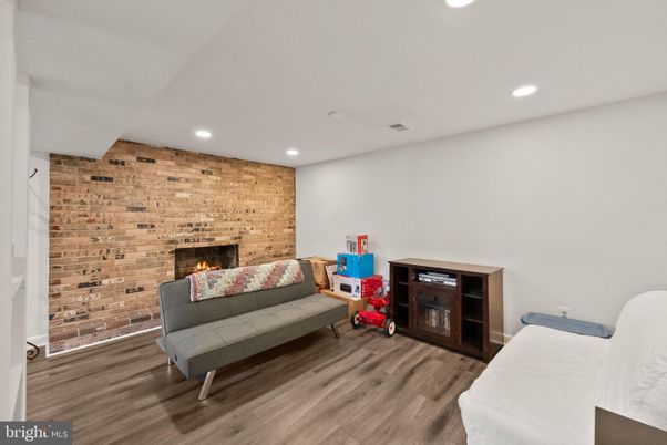Fireplace, Interior, Recessed Lighting, Stone Walls, Wood Texture Flooring