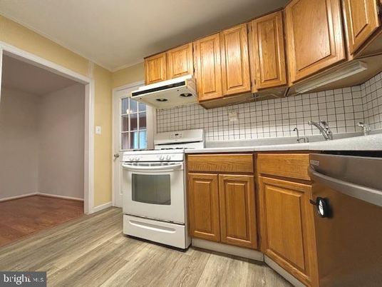 Interior, Kitchen, Tile Countertops, Wood Texture Flooring