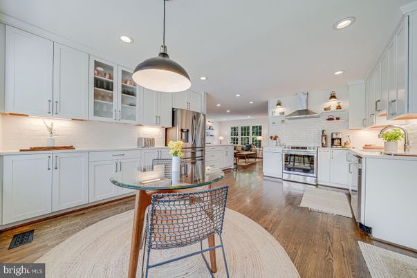 Dining room, Interior, Kitchen, Pendant Lights, Recessed Lighting, Stainless Steel Appliances, Wood Texture Flooring