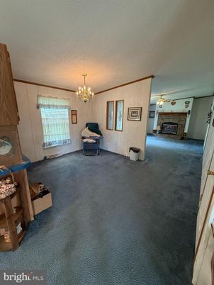 Chandelier, Empty room, Fireplace, Interior