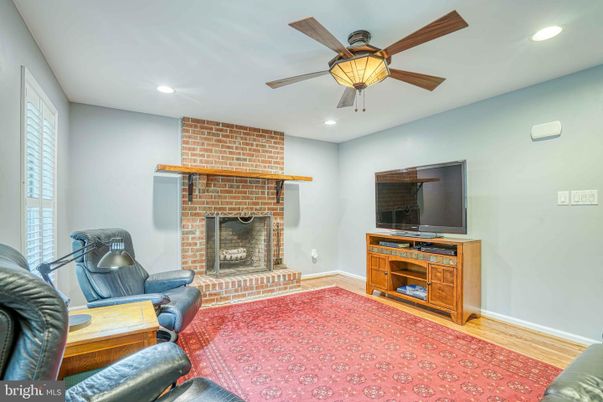 Fireplace, Interior, Recessed Lighting, Stone Walls, Wood Texture Flooring