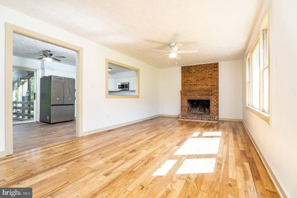 Empty room, Fireplace, Interior, Stone Walls, Wood Texture Flooring