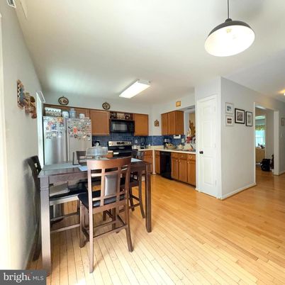 Dining room, Interior, Kitchen, Pendant Lights, Stainless Steel Appliances, Wood Texture Flooring