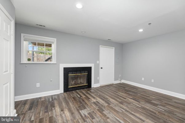 Empty room, Fireplace, Interior, Recessed Lighting, Wood Texture Flooring