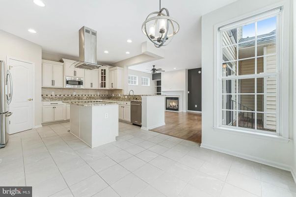 Fireplace, Interior, Kitchen, Pendant Lights, Recessed Lighting, Wood Texture Flooring