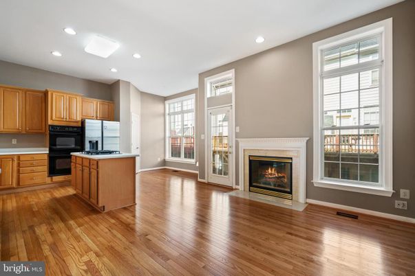 Fireplace, Interior, Kitchen, Recessed Lighting, Wood Texture Flooring