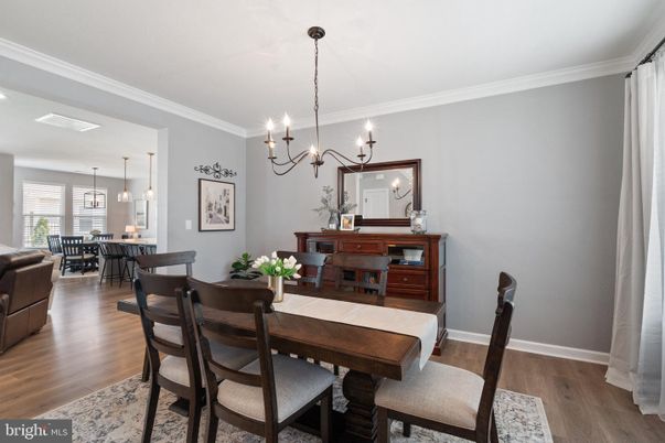 Chandelier, Dining room, Interior, Pendant Lights, Recessed Lighting, Wood Texture Flooring